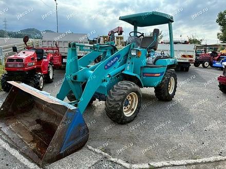 Фронтальный погрузчик KUBOTA RA401 — колесный погрузчик мини, фото с аукциона Японии — фото 3 из 5